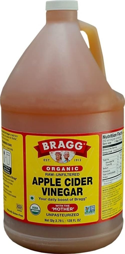 Bragg botella frontal 128 oz mostrando etiqueta y volumen, ideal para despensas