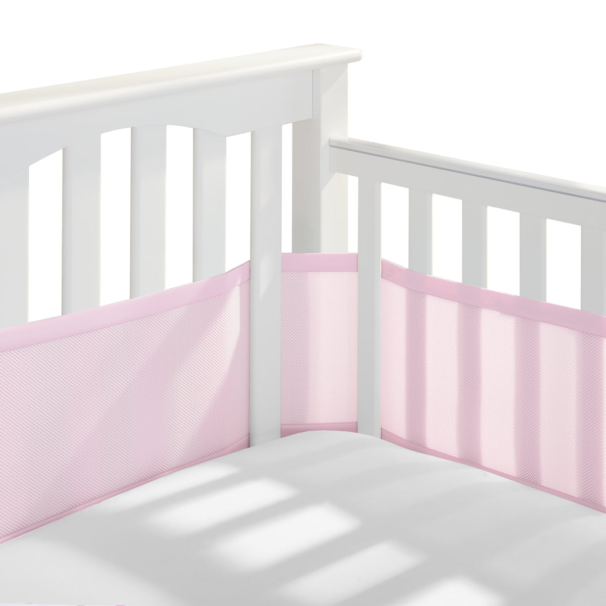 BreathableBaby frente del forro rosa mostrando espacio de ventilación