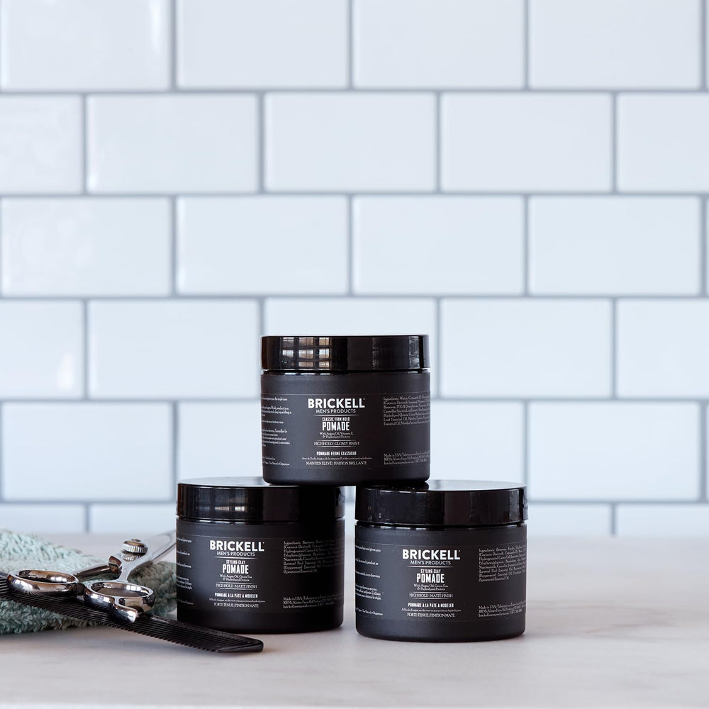 Brickell Men's Products open jar with visible cream and ingredient focus for conditioning