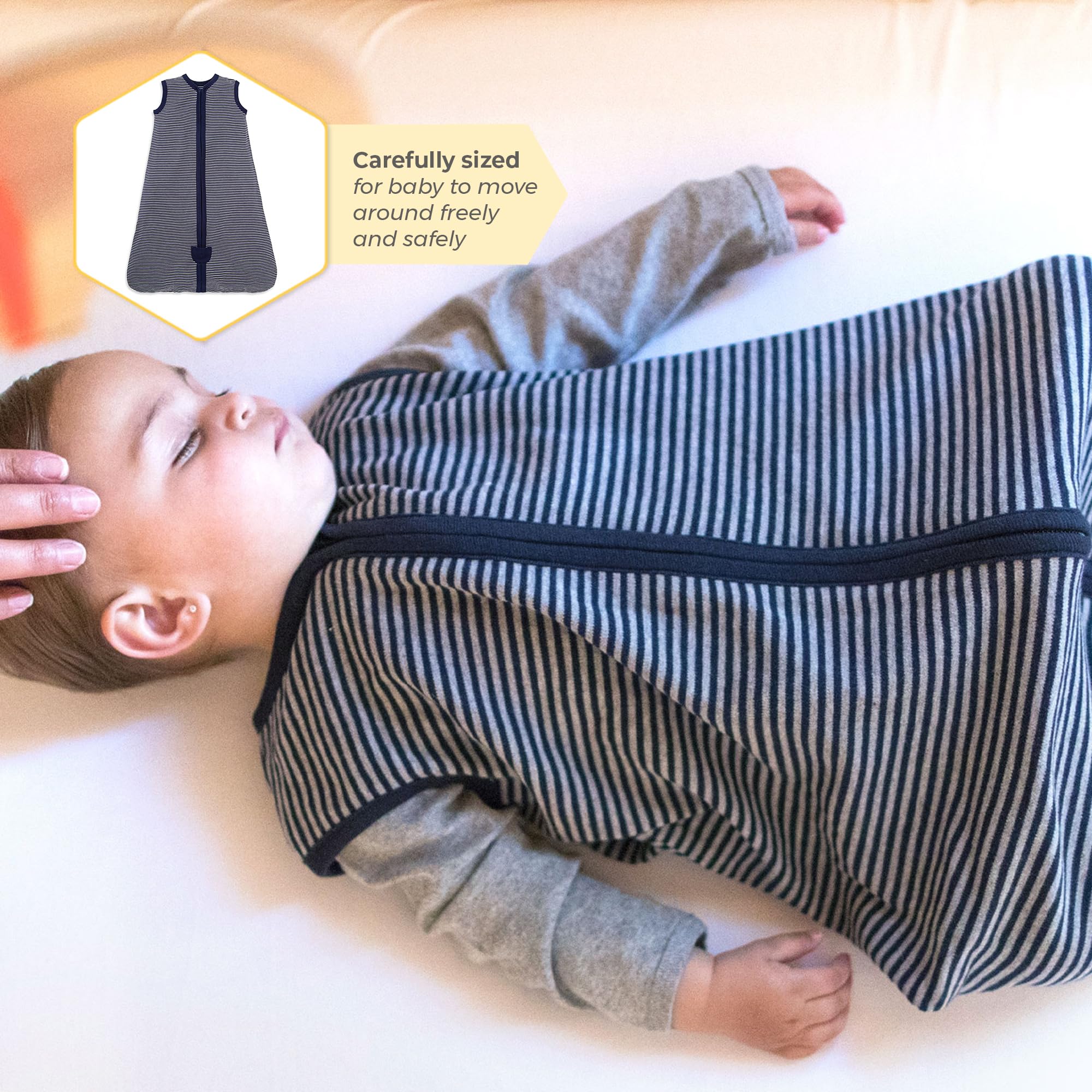 Burt's Bees Baby bebé durmiendo en cuna con saco ponible para sueño más seguro