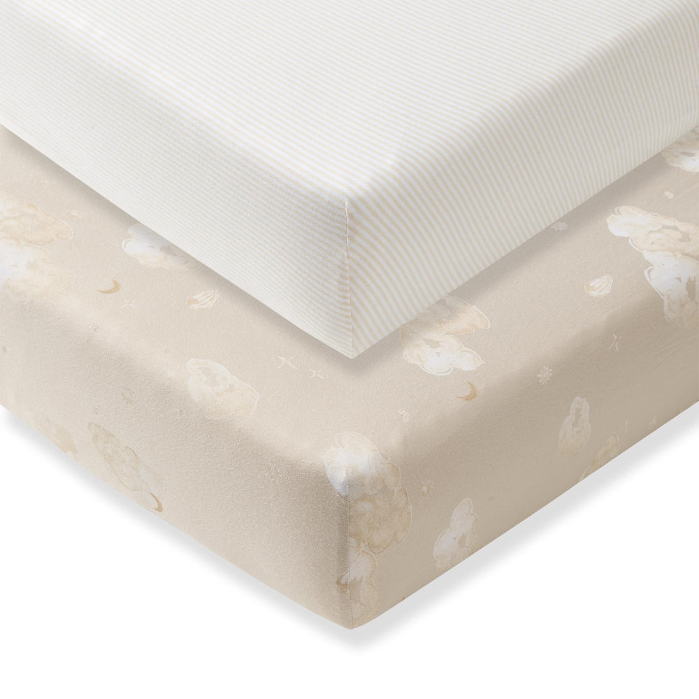 Burt's Bees Baby empaque frontal mostrando sábana ajustable y beneficios