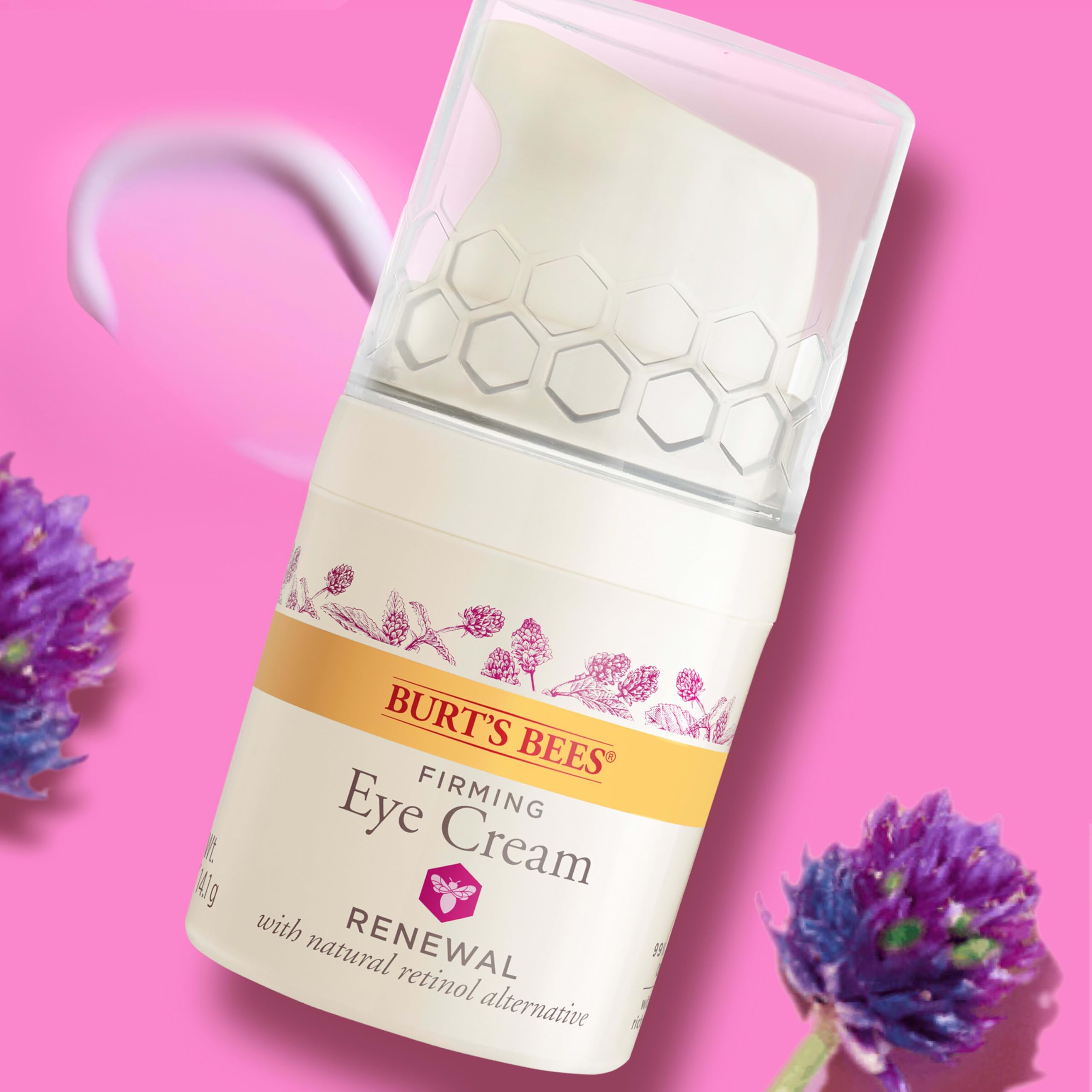 Burt's Bees crema junto a otros productos Renewal en mesa de baño ordenada