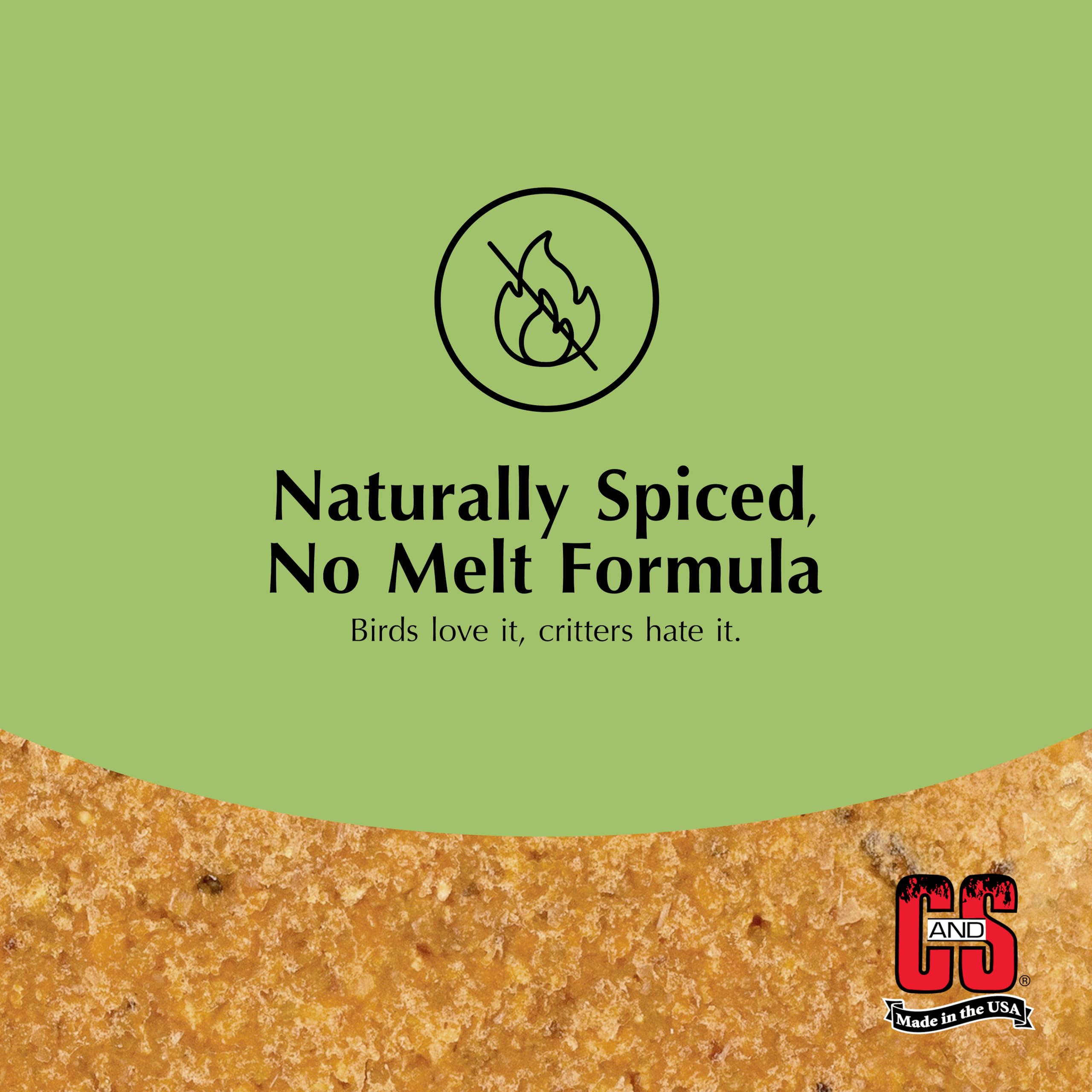 Hand holding C&S hot pepper suet cake for clear size and scale reference