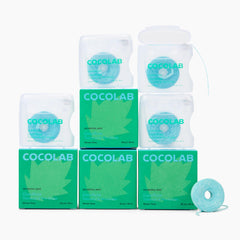 Cocofloss empaquetado frontal mostrando el pack de cuatro y frescura