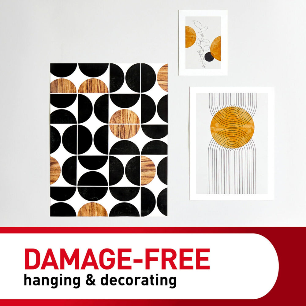Command poster strips adhering to glass window offering residue-free display