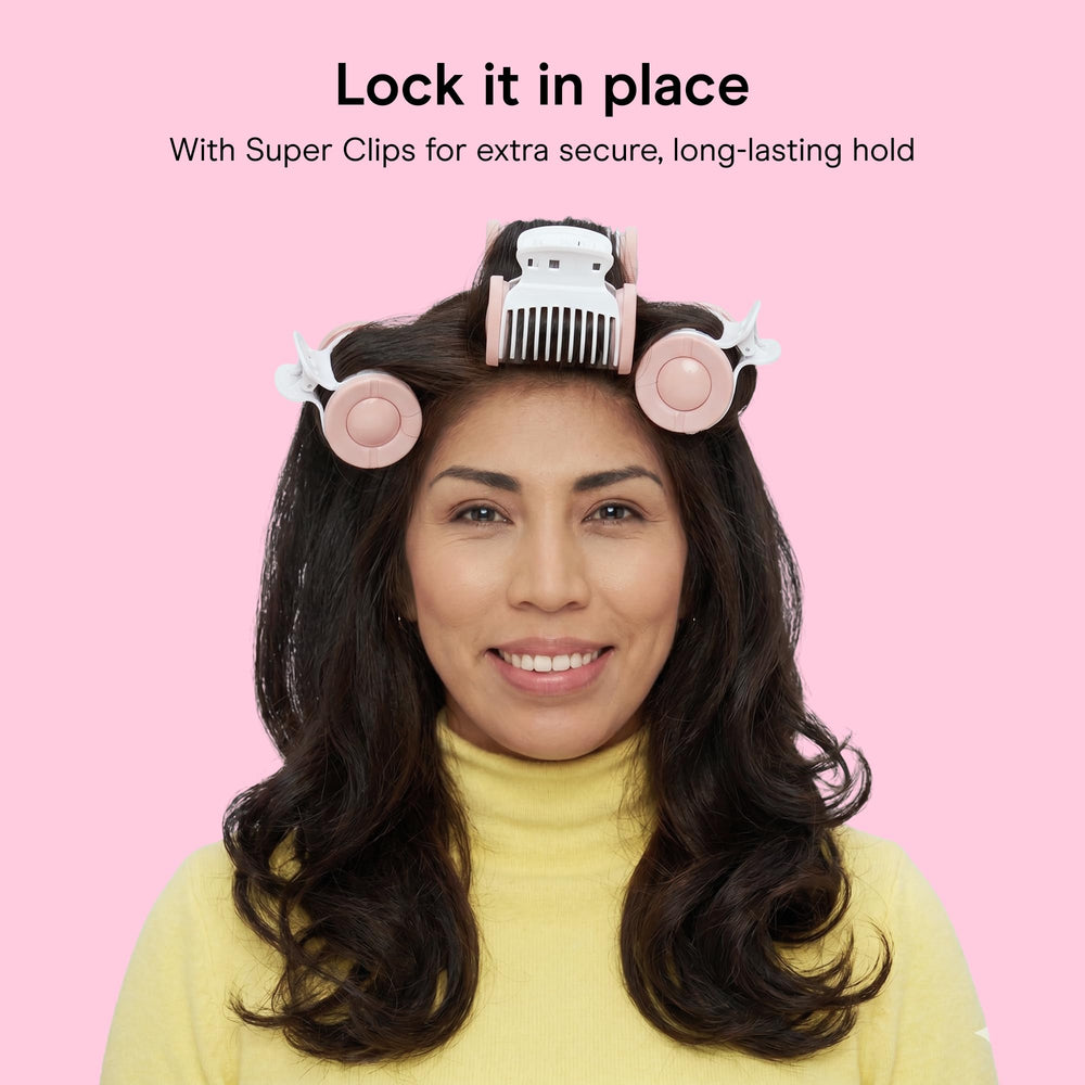 Conair clip super resistente sujetando el rodillo con firmeza durante el peinado