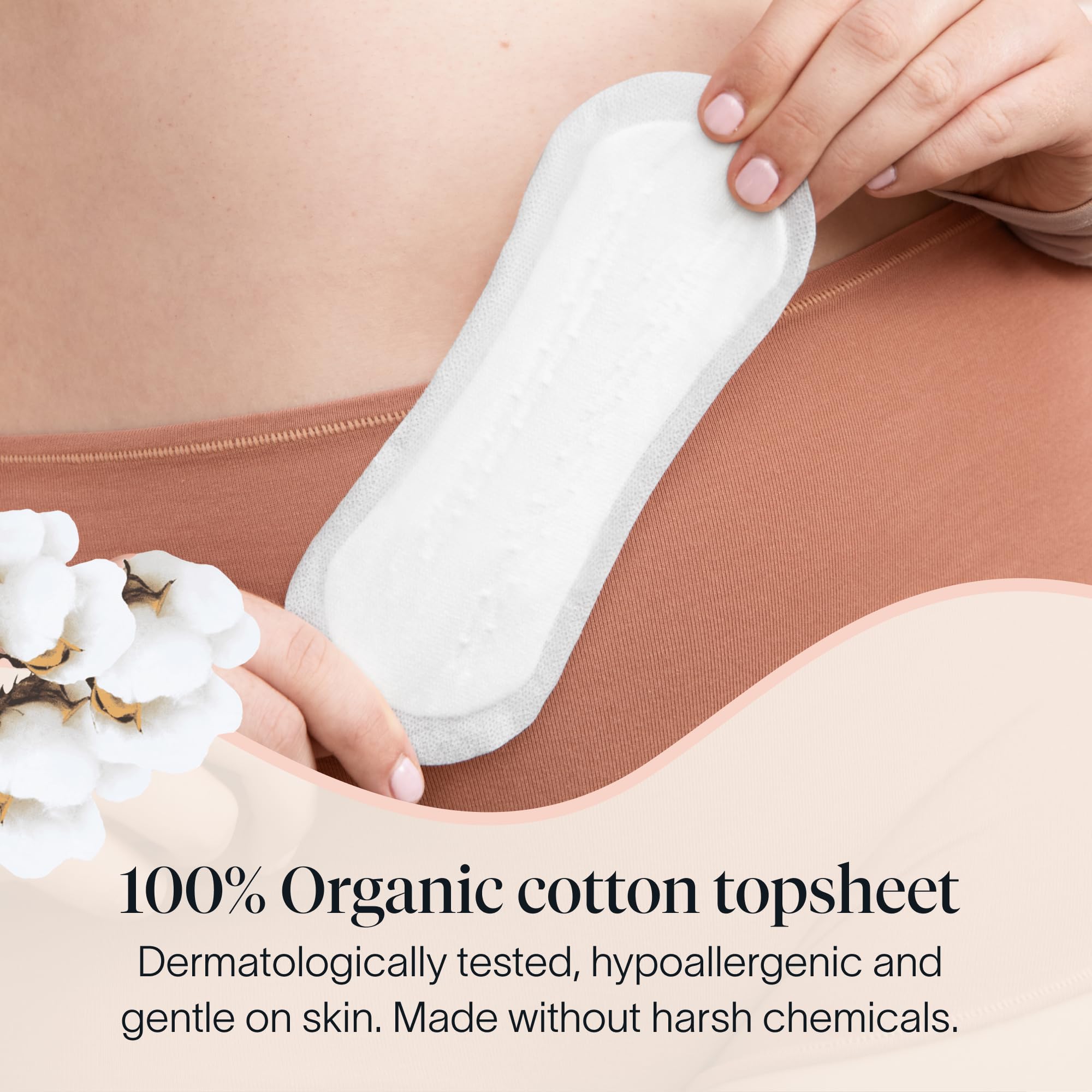 Detalle del topsheet 100% algodón orgánico de Cora que resalta suavidad y cuidado para la piel