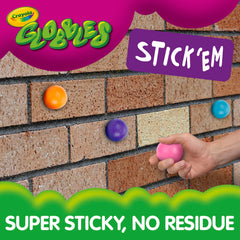 Crayola Globbles en mano demostrando compresión y alivio de tensión