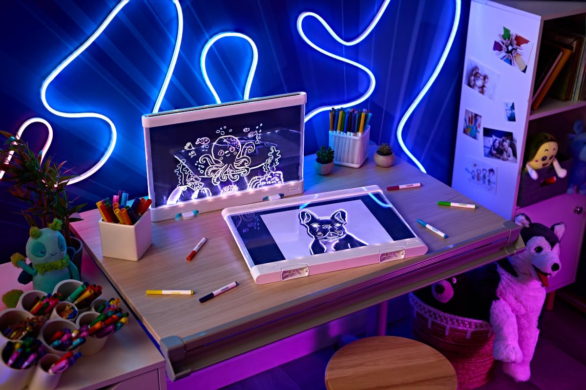 Crayola Ultimate Light Board with kickstand open beside a ruler to show size and portable design