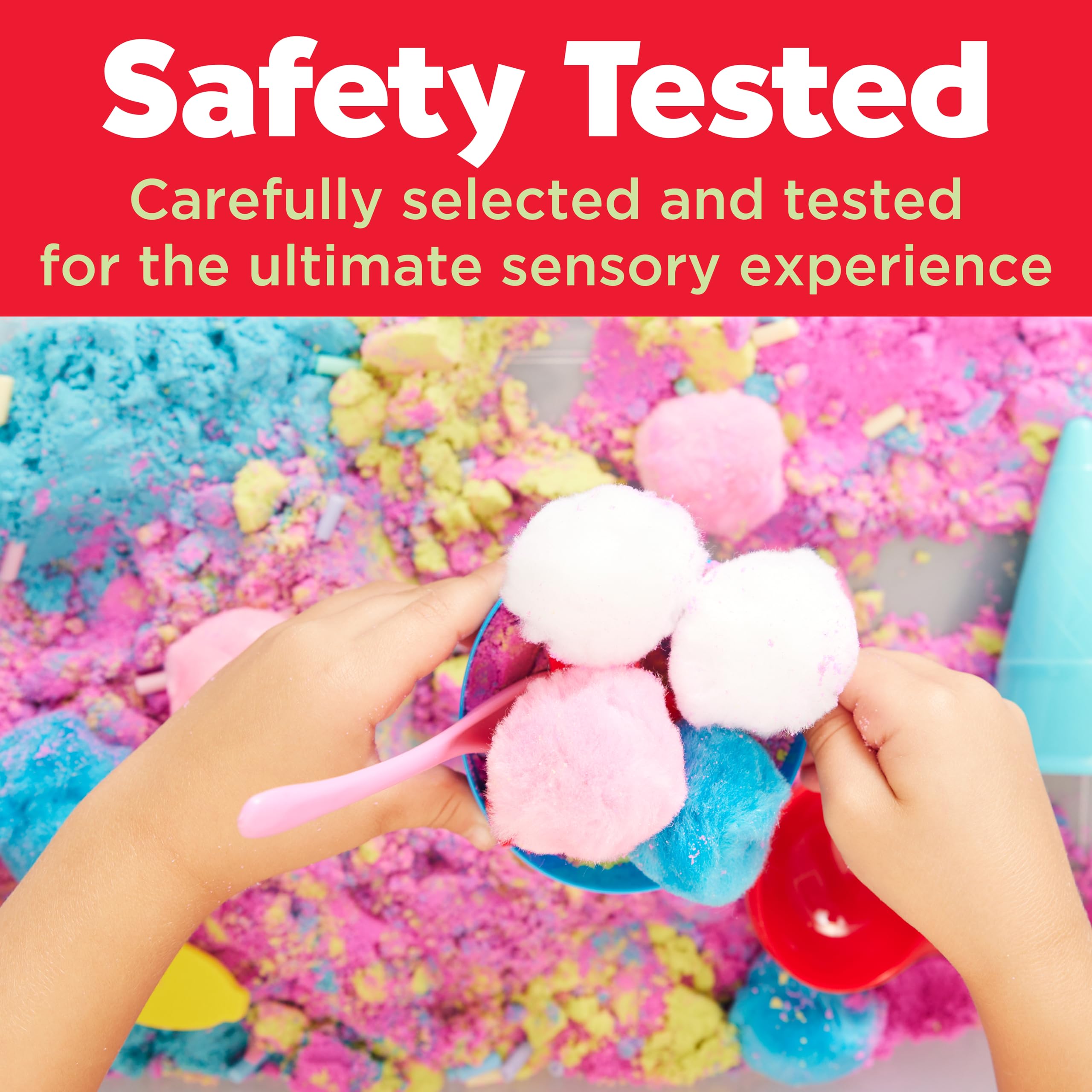 Creativity for Kids child scooping sand from the playset demonstrating hands-on learning
