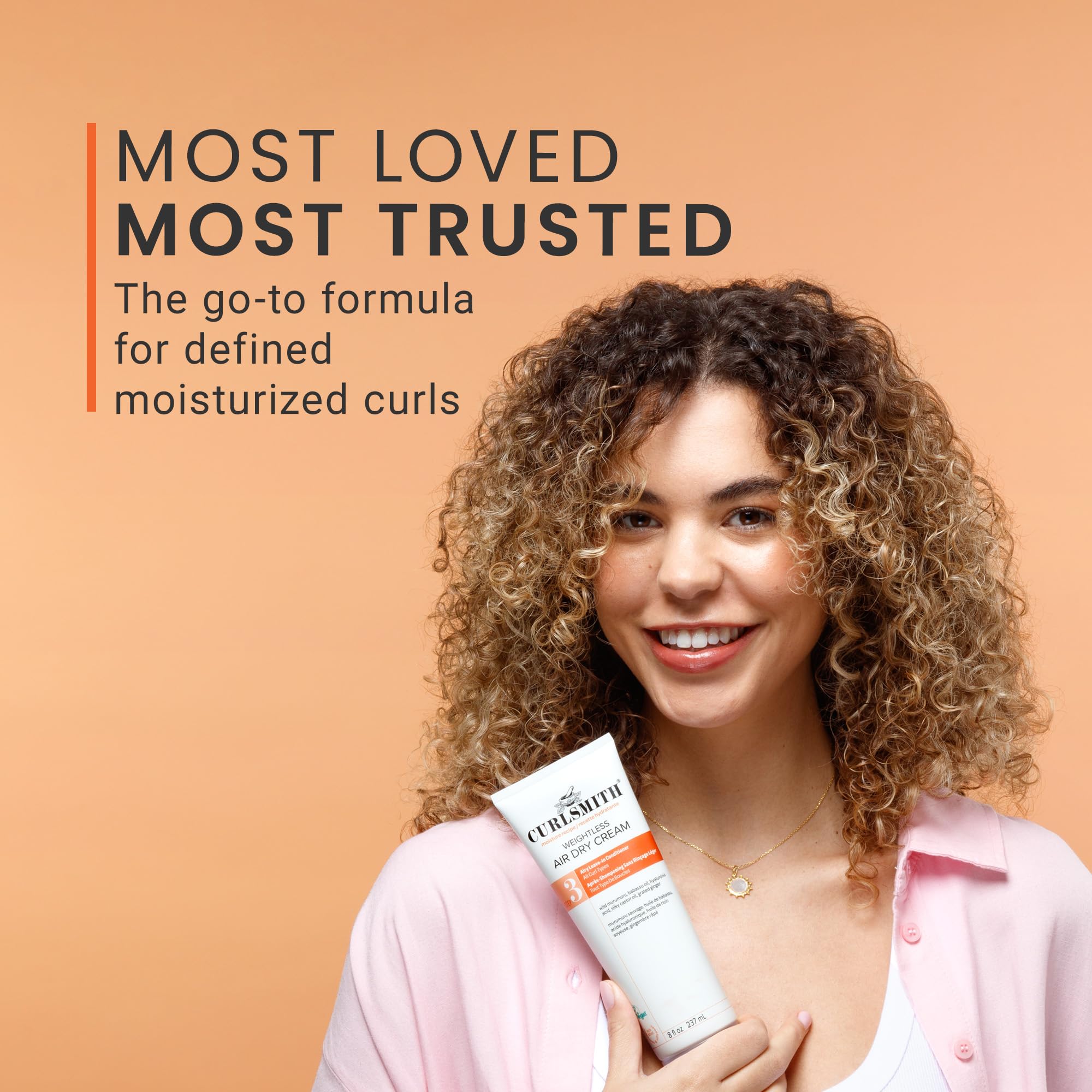 CURLSMITH crema distribuida en rizos húmedos para definición sin peso
