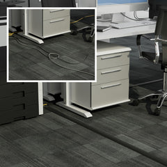 D-Line cubrecables en oficina cubriendo extensiones, evitando tropiezos