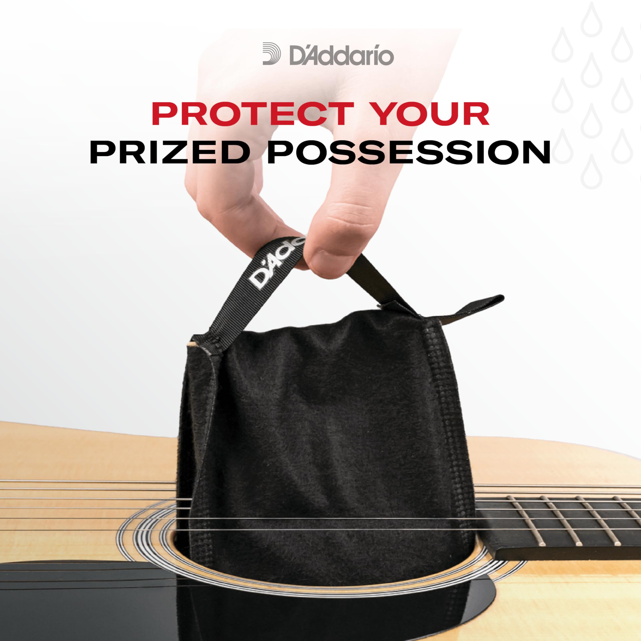 D'Addario paquetes junto a una guitarra para comparar escala y uso práctico