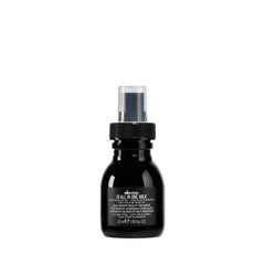 Davines OI front packaging showing travel-size bottle and brand shine benefit