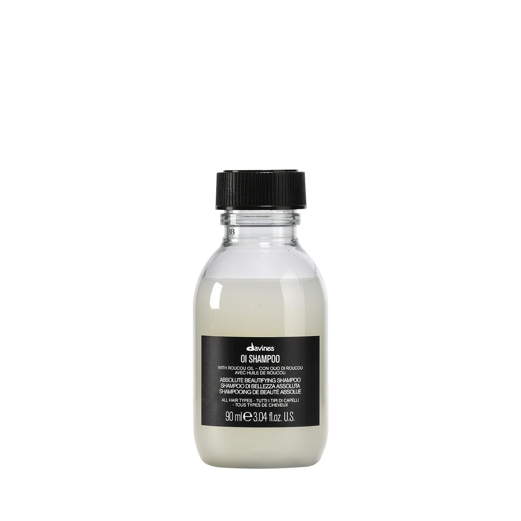 Davines OI champú frontal tamaño viaje mostrando diseño práctico