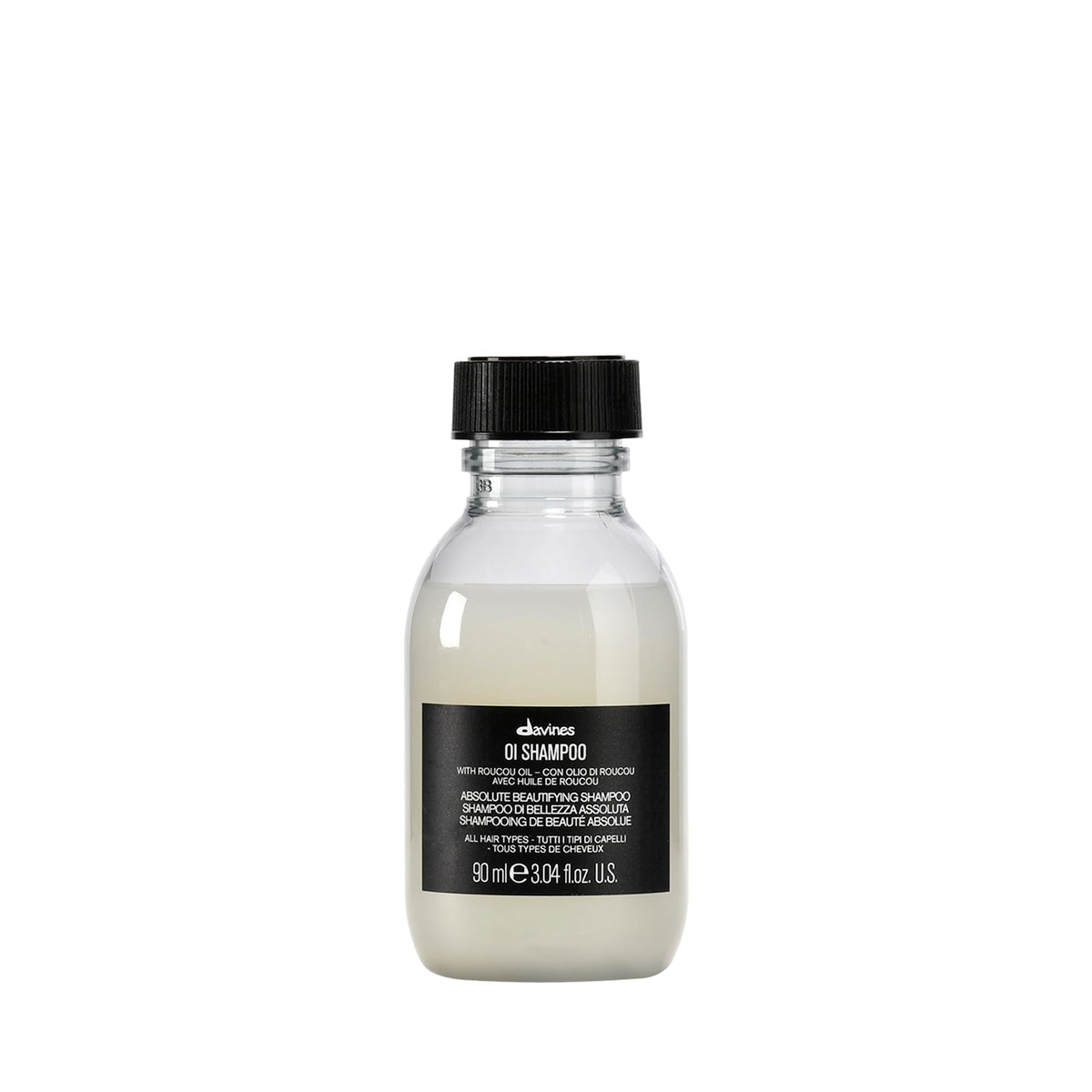 Davines OI champú frontal tamaño viaje mostrando diseño práctico