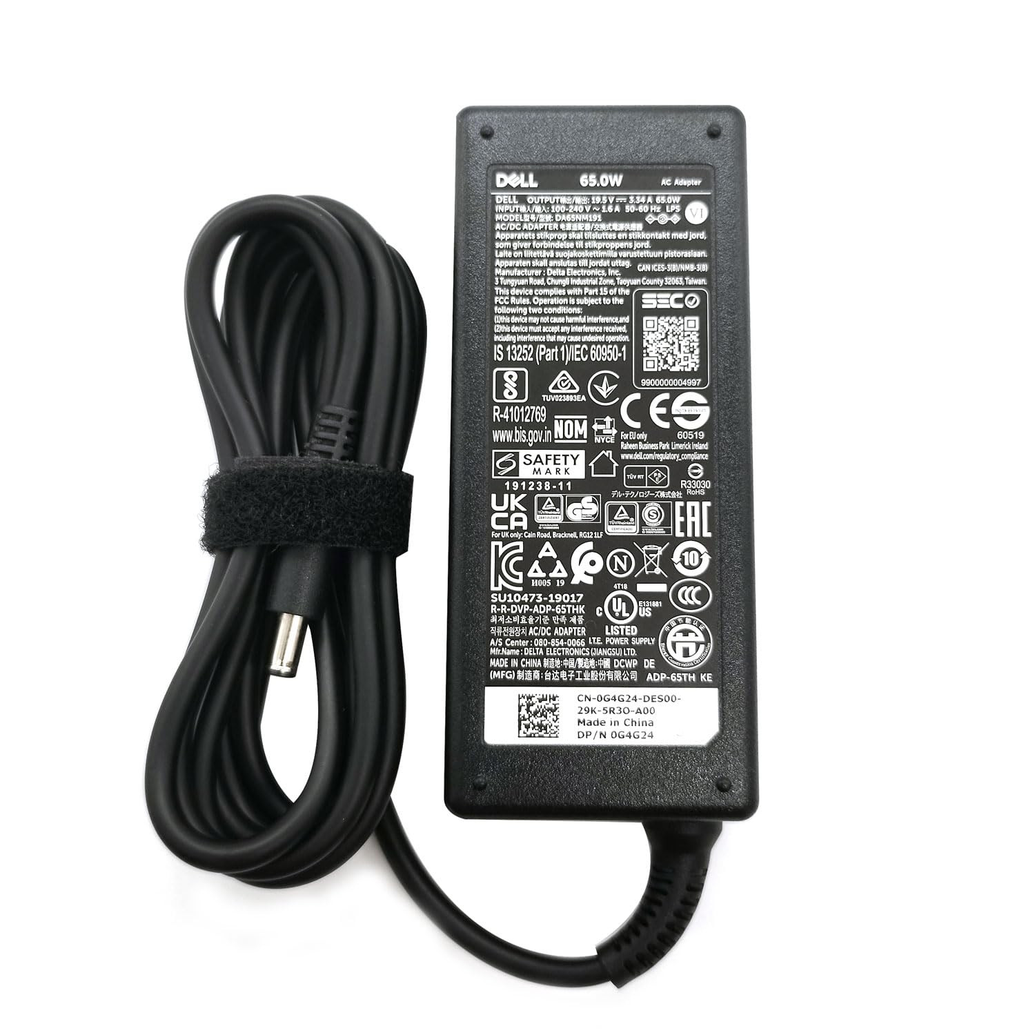 Dell cargador 65W con cable y adaptador visto desde arriba, fácil transporte