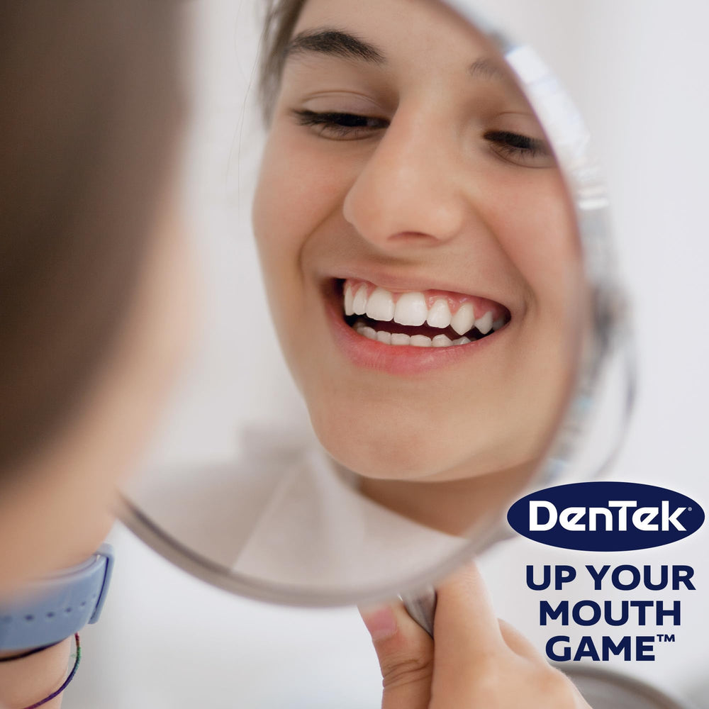 DenTek palillo limpiando alrededor de brackets demostrando compatibilidad con ortodoncia