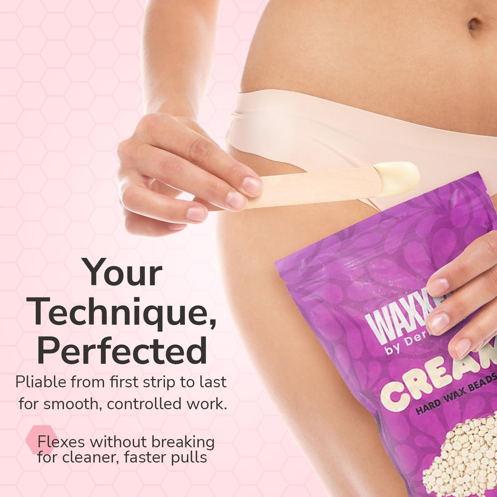 Dermwax aplicación con espátula demostrando extensión suave y cobertura uniforme