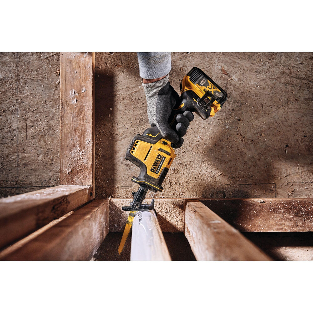 DEWALT blade-release close-up shows tool-free change for fast swaps