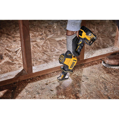 DEWALT saw being used one-handed for improved reach and control