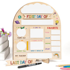 DINIZON child holding sign outdoors for lively back-to-school portrait