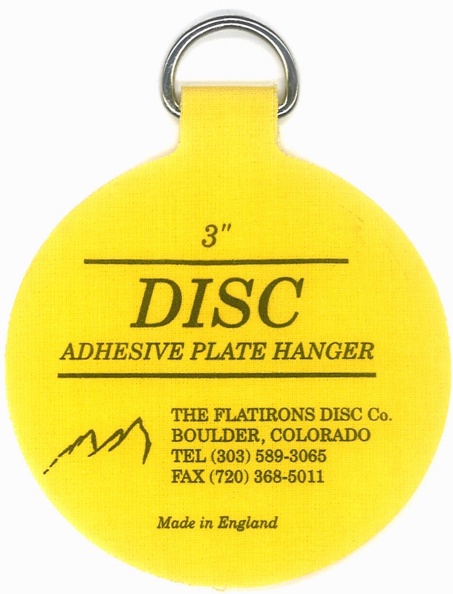 Disc primer plano del disco adherido al reverso de un plato, fijación invisible y segura