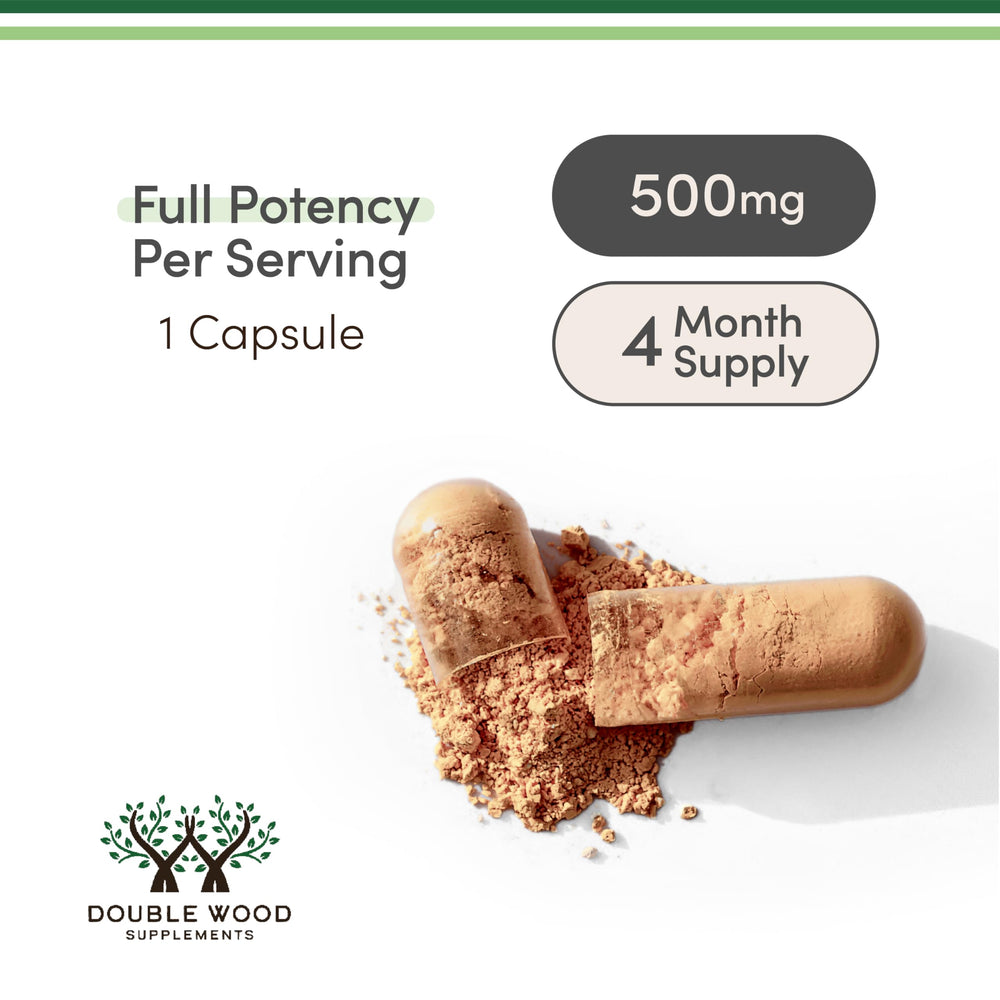 Cápsulas de Double Wood Rhodiola en mano para visualizar la dosis y facilidad de uso