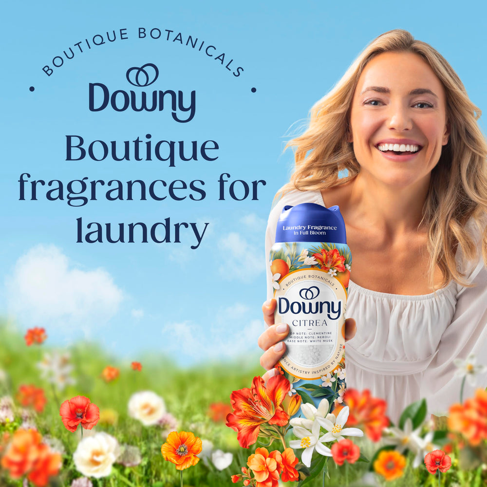 Downy tapa dosificadora abierta con perlas lista para medir y dosificar