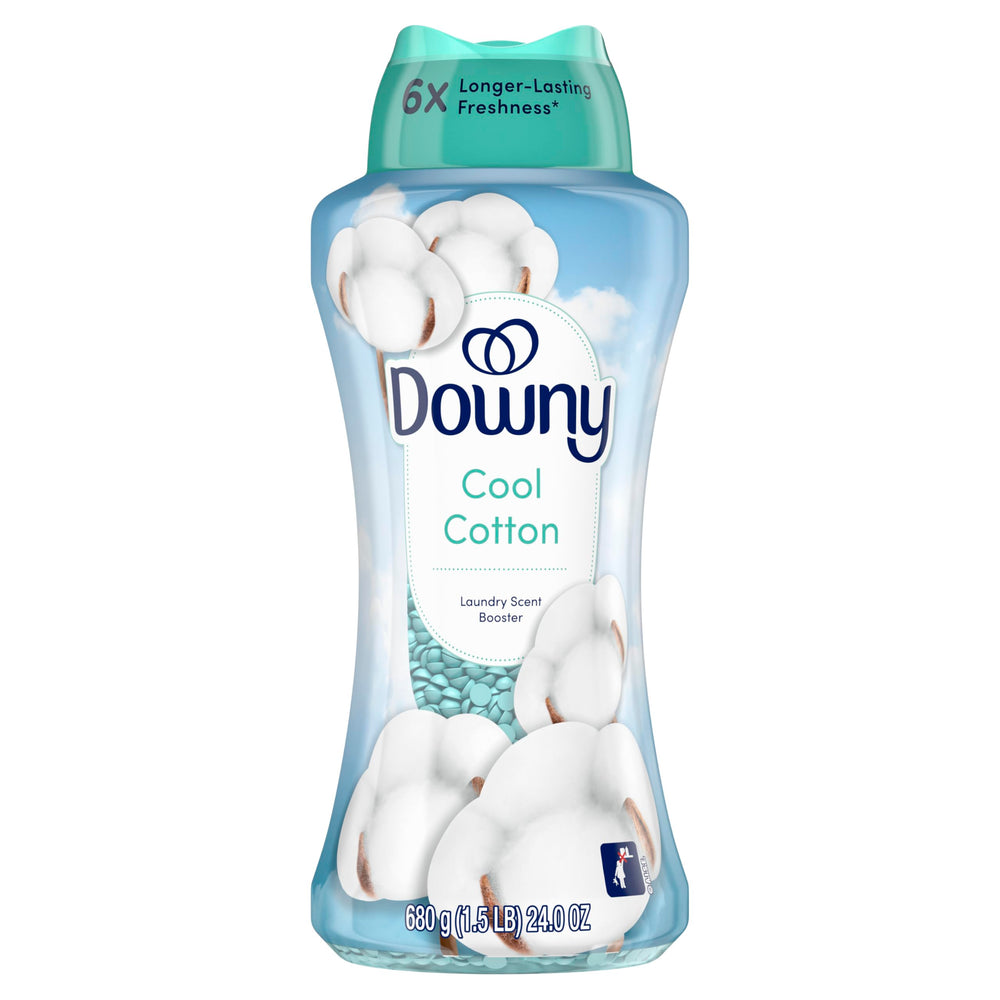 Downy escena hogareña con sábanas perfumadas transmitiendo confort