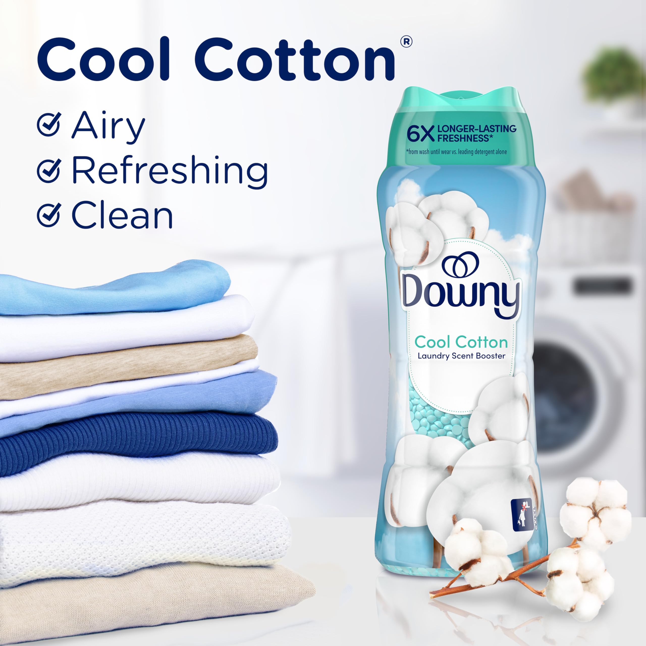 Downy envase de 24 oz junto a regla para comparar tamaño y conveniencia