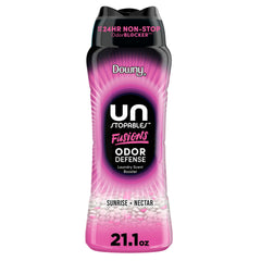 Downy Unstopables envase frontal mostrando fragancia Sunrise + Nectar y beneficio de aroma duradero