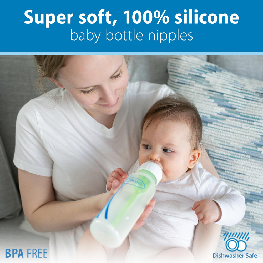 Dr. Brown's bottle in hand demonstrating narrow shape and comfortable grip
