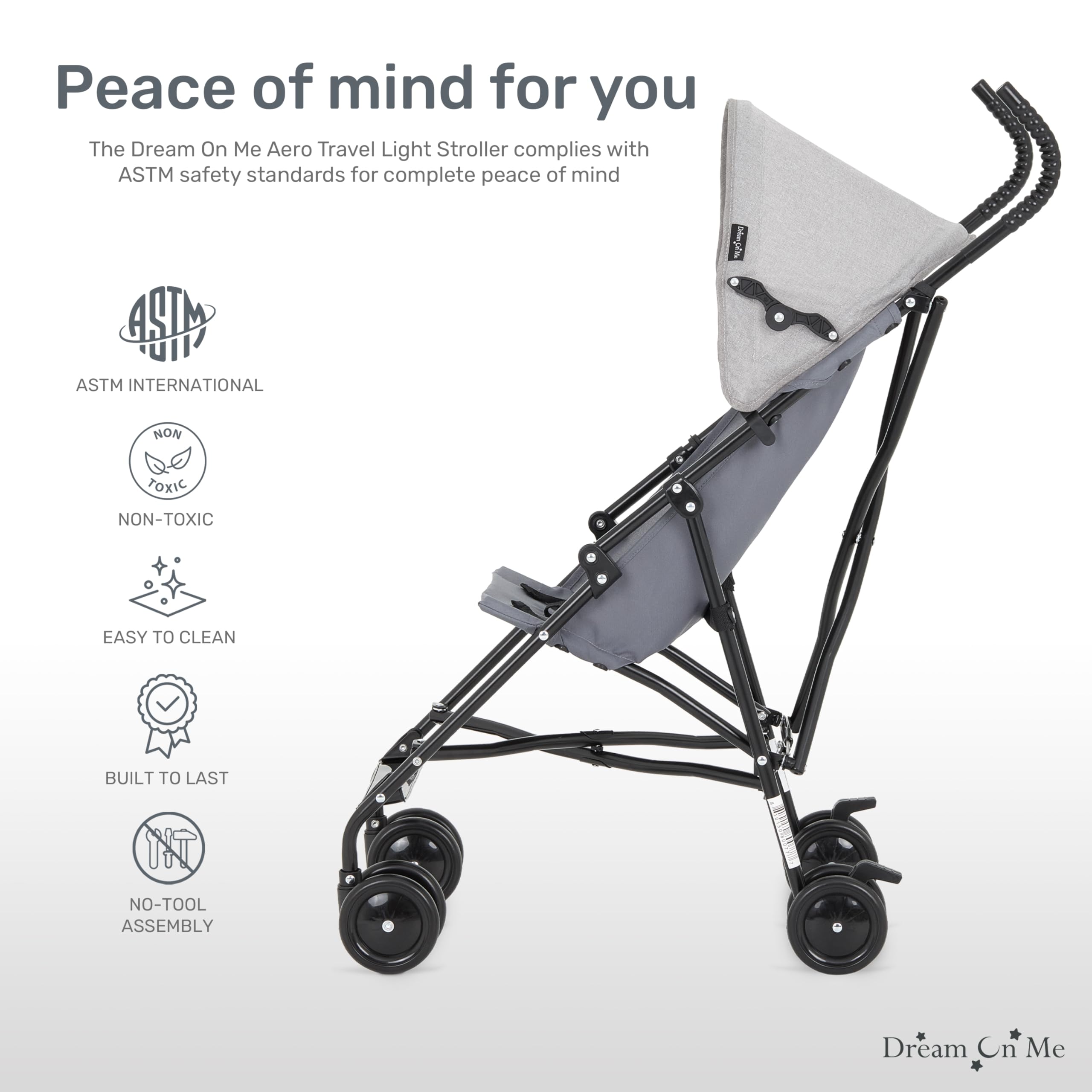 Dream On Me Aero plegado con una mano demostrando almacenamiento compacto