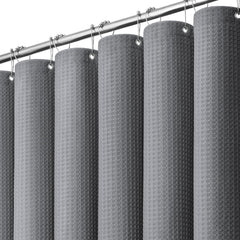 Dynamene vista frontal de cortina waffle gris con caída elegante