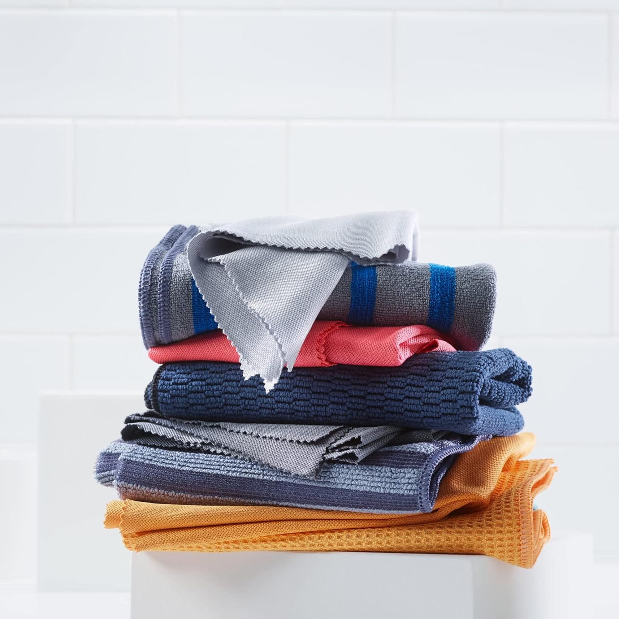 E-Cloth paños junto a una mano mostrando tamaño práctico y control