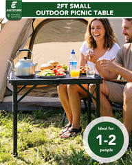 E EASTSTORM set at low 10.6-inch height next to ground chair for comfortable dining