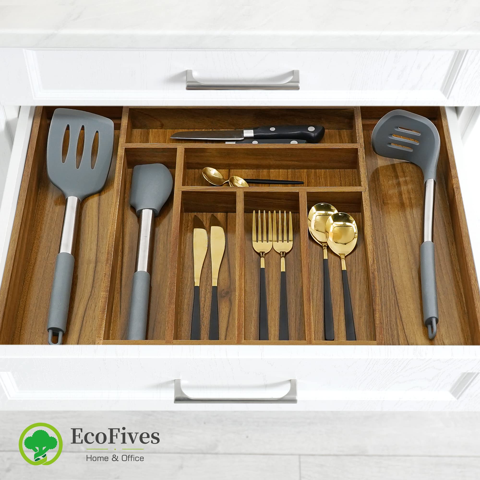 EcoFives detalle del mecanismo expansible lateral que adapta el organizador al cajón