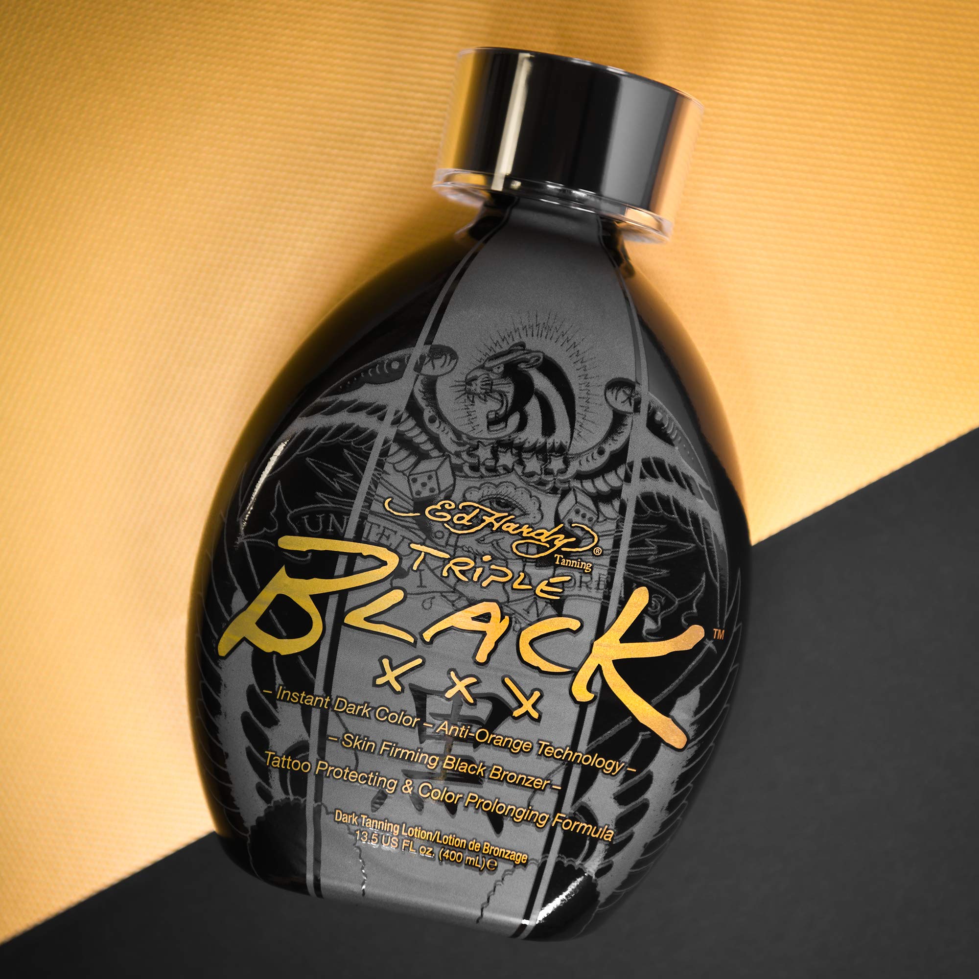 ED HARDY aplicación de Black XXX en brazo mostrando color instantáneo oscuro