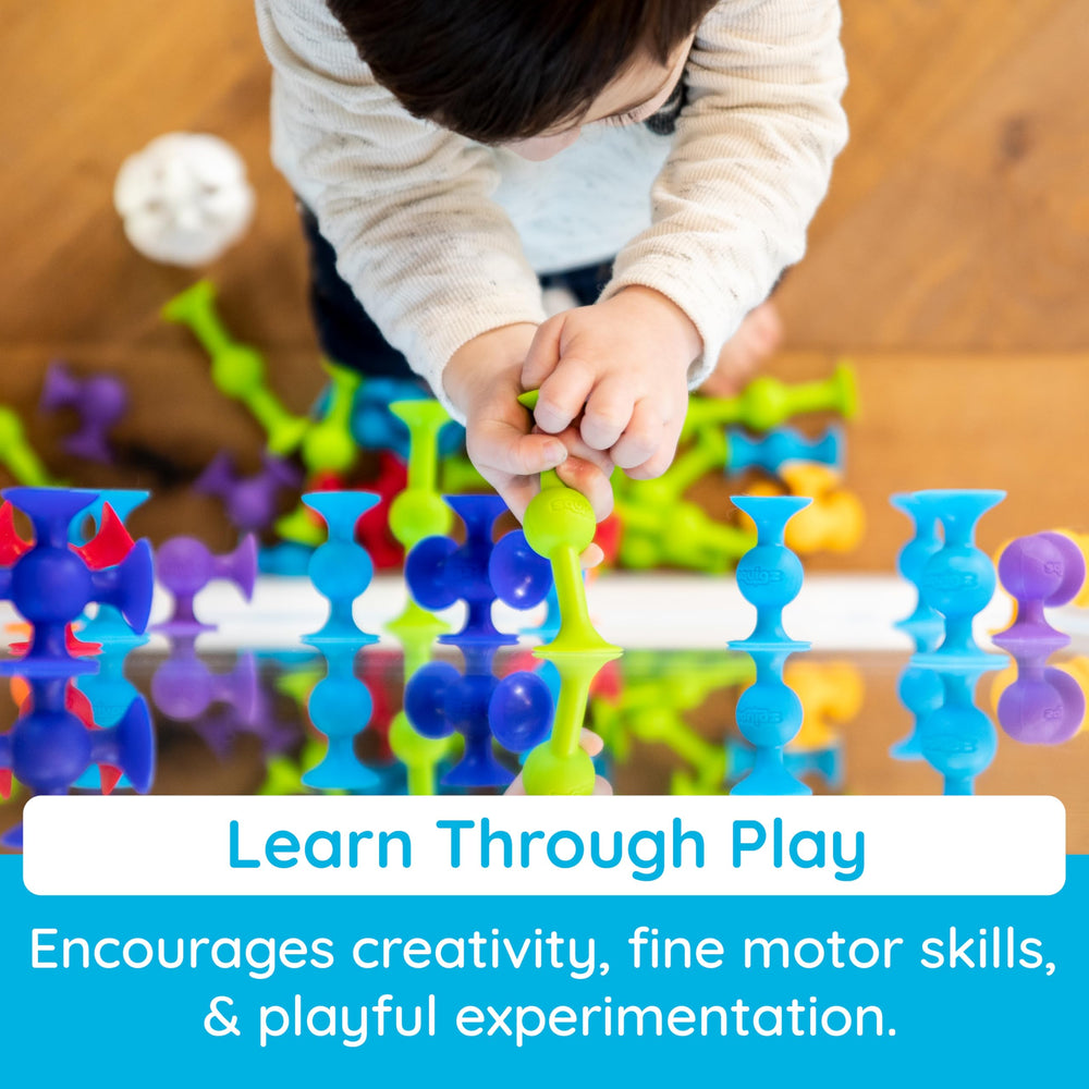 Fat Brain Toys Squigz muestra de colores variados que estimulan reconocimiento y juego sensorial
