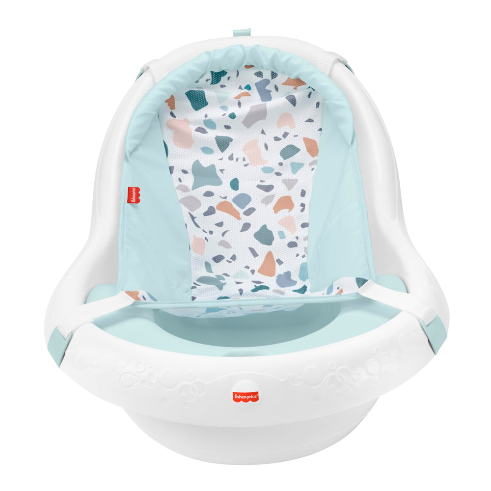 Fisher-Price bañera en fregadero demostrando ajuste y ahorro de espacio