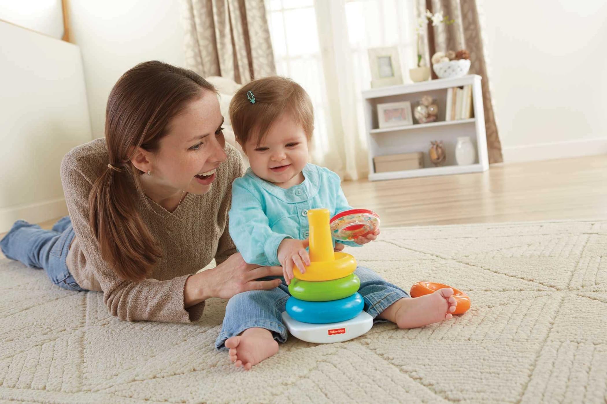 Fisher-Price detalle de anillos coloridos y textura, favorece agarre seguro
