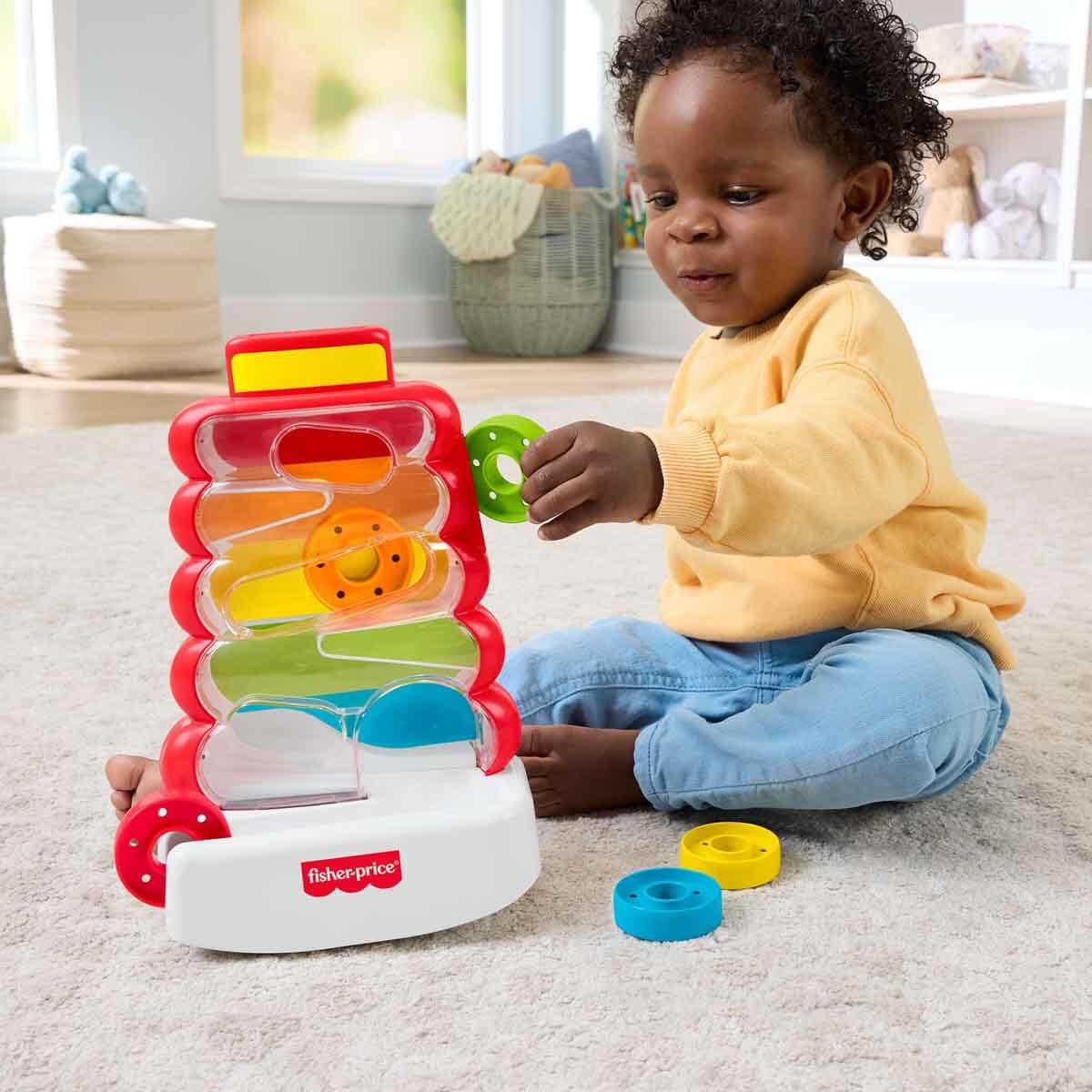 Fisher-Price aros coloridos apilados mostrando atractivo visual