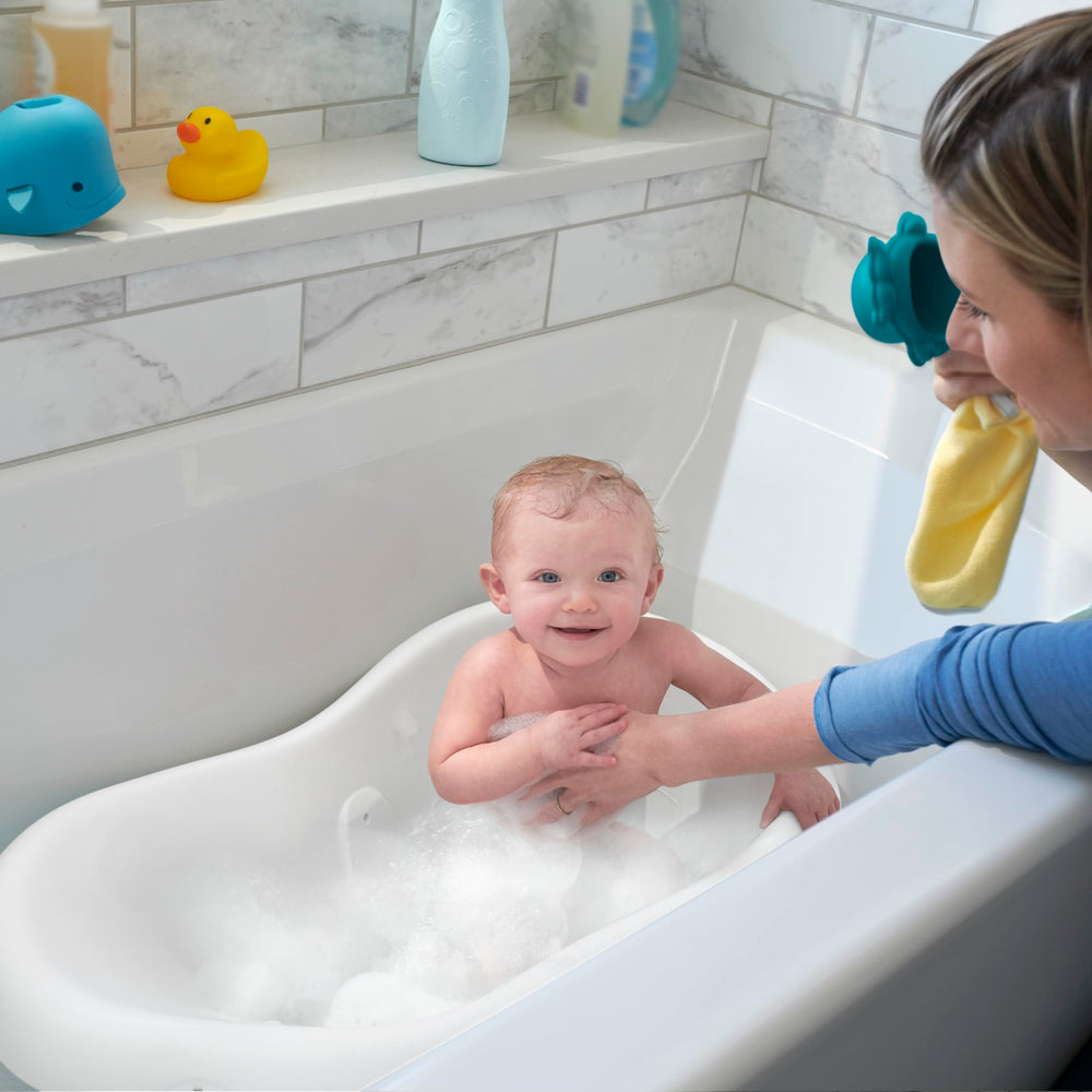 Fisher-Price hamaca de malla suave brindando soporte seguro al recién nacido
