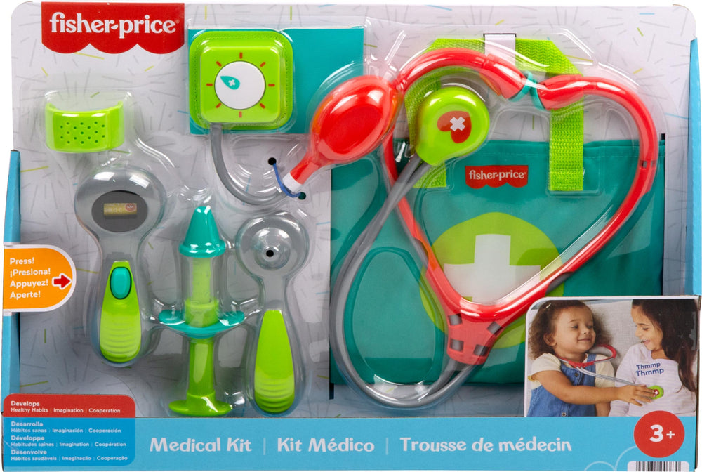 Fisher-Price escena de juego con niño atendiendo muñeco fomentando empatía y habilidades sociales