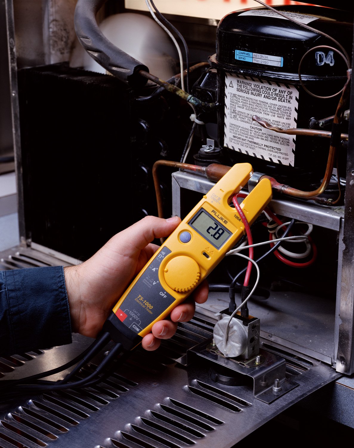 Fluke T5-600 sujeto al cinturón con holster H5 opcional para movilidad segura