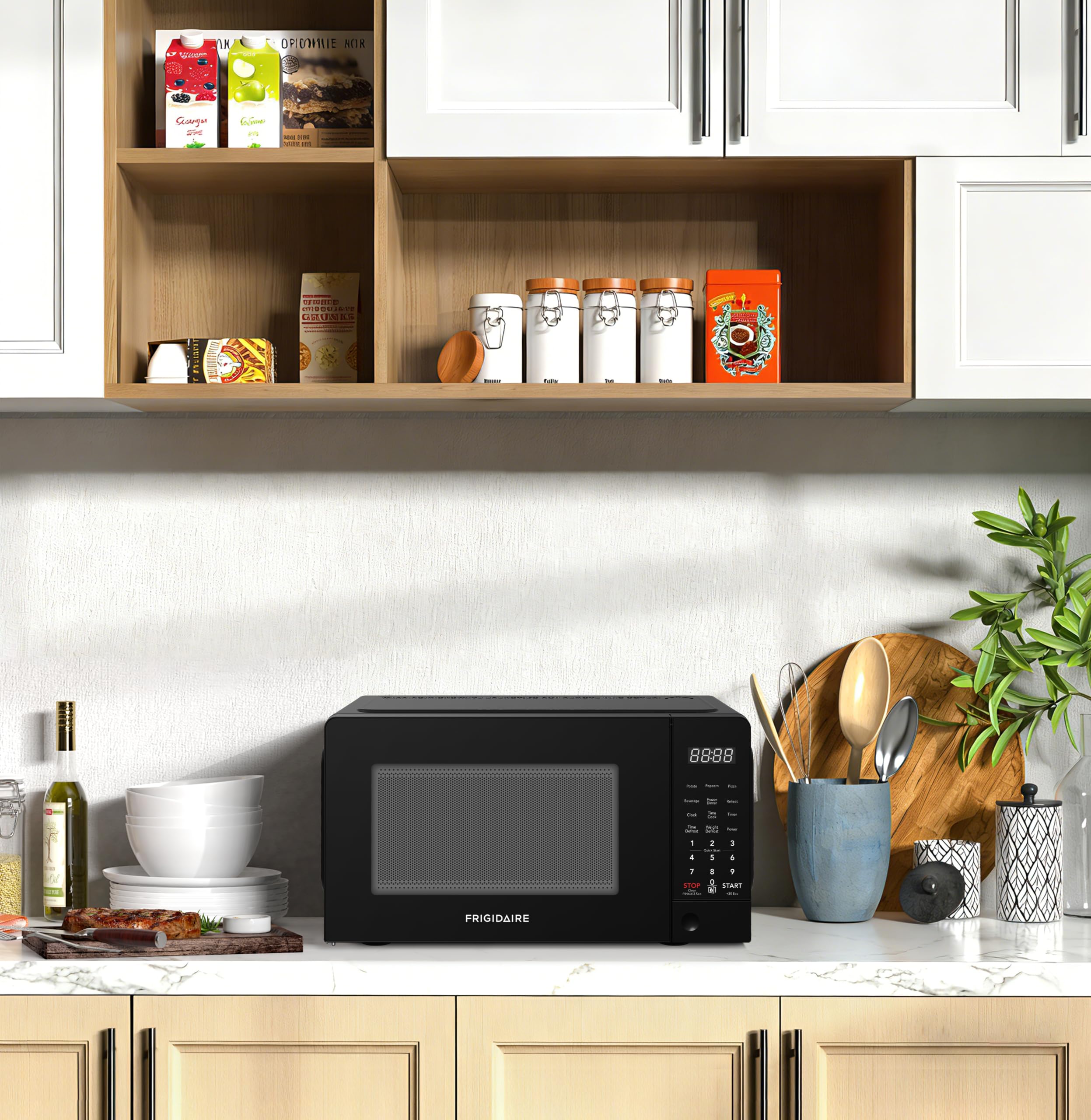 Frigidaire acabado negro textura exterior elegante que combina con encimeras modernas