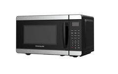 Frigidaire EMW727 interior con plato de vidrio calor uniforme y fácil lavado