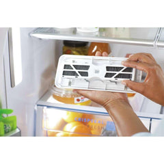 Frigidaire PureAir AF-2 comparación de tamaño junto a objetos domésticos para escala