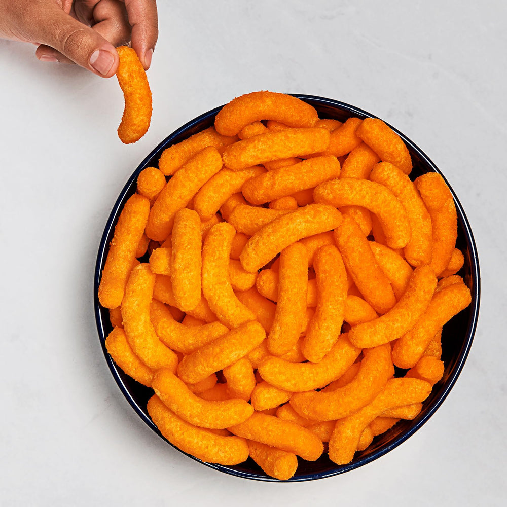Frito-Lay snacks servidos en mesa de fiesta para compartir